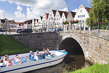 Excursion boat on a canal, Friedrichstadt, Schleswig Holstein, Germany, Europe