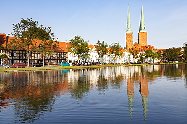 Cathedral reflected in the River Trave, Stadttrave, Lubeck, Schleswig Holstein, Germany, Europe 