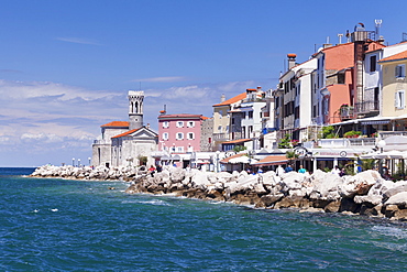 Promenade and church of Santa Clemente at sunset, Piran, Istria, Slovenia, Europe