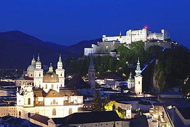 High angle view of the Old Town, UNESCO World Heritage Site, with Hohensalzburg Fortress and Dom Cathedral at dusk, Salzburg, Salzburger Land, Austria, Europe 