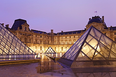 Illuminated Louvre Museum and Pyramid at night, Paris, Ile de France, France, Europe