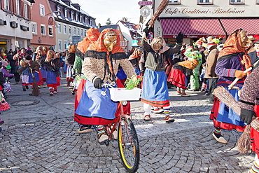 Two witches on a bike, Swabian Alemannic Carnival, Gengenbach, Black Forest, Baden Wurttemberg, Germany, Europe