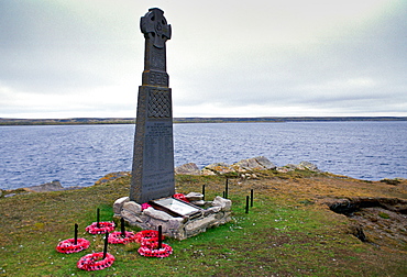 Welsh Guards Memorial - a Welsh cross - at Fitzroy Cove, Falkland Islands