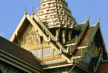 Detail of the ornately decorated roof of the Grand Palace in Bangkok, Thailand.