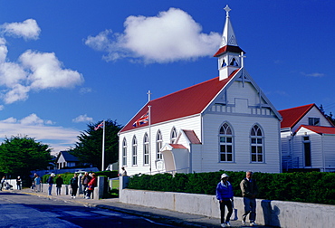 People walking along Main Street in Port Stanley, Falkland Islands