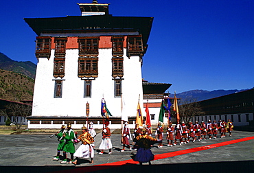 Musicians of the royal procession in a parade at Tashichho Dzong in Thimpu, Bhutan