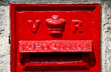 Wall Mounted Post-Box showing the cipher VR for the reign of Queen Victoria