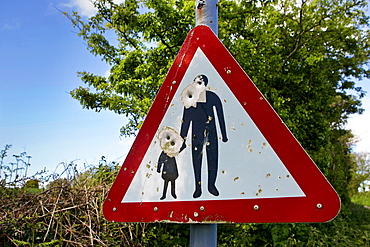 Road sign used for target practice and shot with airgun pellets,  North Cornwall