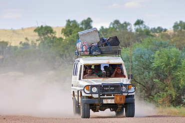 Four-wheel-drive vehicle on the Mereenie Loop Road, West Macdonnell National Park, Red Centre, Australia