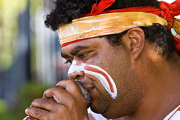 Australian Aborigine plays didgeridoo, New South Wales, Australia