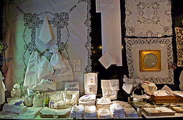 Display of white linen in draper's shop in Kloskanthuis, Ghent, Belgium