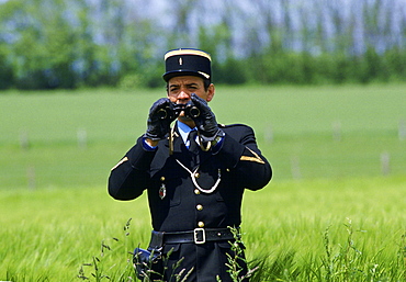 French gendarme police officer on security duty during Normandy celebrations, France