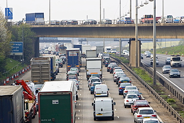 Heavy weight of traffic travelling on M1 motorway in Hertfordshire, United Kingdom