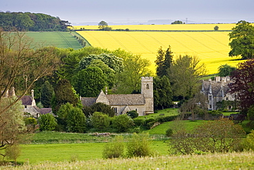 Asthall Manor House, village and Church of St Nicholas in The Cotswolds, Oxfordshire, United Kingdom