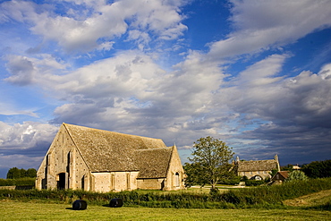 Great Coxwell Barn, built 1300, owned by the National Trust, in The Cotswolds, Oxfordshire, UK