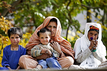 Pakistani family in mountain village of Altit in Hunza region of Karokoram Mountains, Pakistan