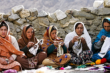 Women sew together in mountain village of Altit in Hunza region of Karokoram Mountains, Pakistan