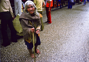 Elderly woman begging in the streets of Baguio, Northern Luzon, Philippines