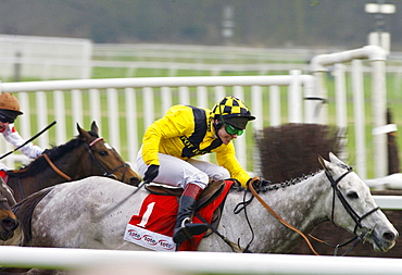 Richard Johnson Riding Rooster Booster In The Tote Gold Trophy Hurdle Race At Newbury Racecourse to Take Second Place