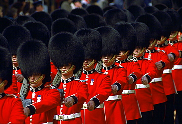 Guards in bearskins march in Windsor, England