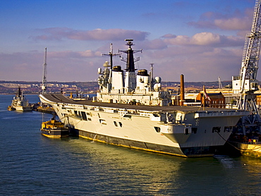 Aircraft carrier HMS Invincible moored at Portsmouth Harbour, England