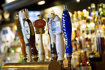 Beer taps in Georgetown bar, Washington DC, USA