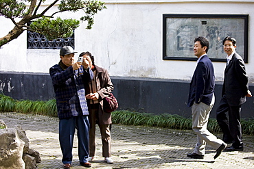 Visitors in the Yu Gardens, Shanghai, China