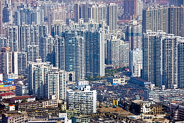 Shanghai skyline of high rise apartment blocks seen from the Oriental Pearl Television Tower, China