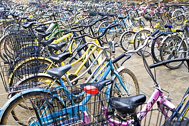 Bicycles lined up outside a school in Xingping, China