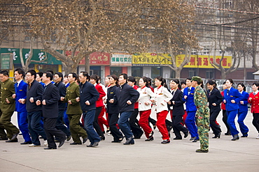 Staff on morning exercise in the grounds of the Shaanxi History Museum, Xian, China