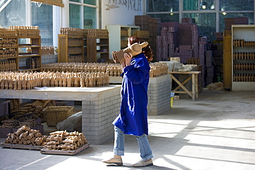 Terracotta Warrior souvenirs being made in factory, Xian, China