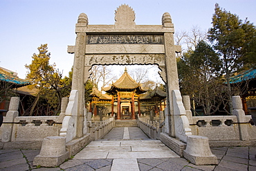 Stone Memorial Gateway leading to the Phoenix Pavilion at the Great Mosque in the Muslim area of Xian, China