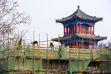 Workmen carry out repair work in Xian, China