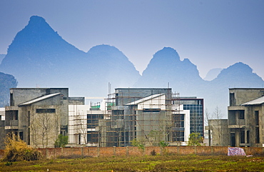 Hotel complex under construction by the Li River between Guilin and Yangshuo, China