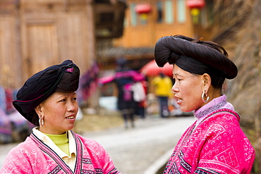 Women from Yao minority nationality with traditional long hair according to folk custom, Ping An, Guilin, China