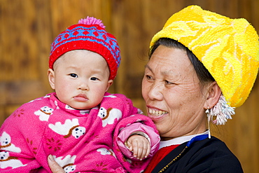 Grandmother and child from Zhuang Minority Group, Ping An, Guilin. China has a one child policy to limit population.