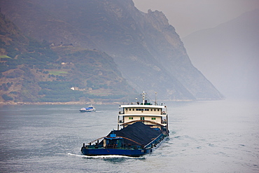 Transportation of coal by boat in Three Gorges area, Yangtze River, China