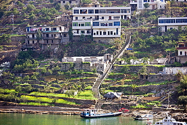 Houses which will be destroyed by Three Gorges dam project are dismantled and re-built on higher ground, Yangze River, China