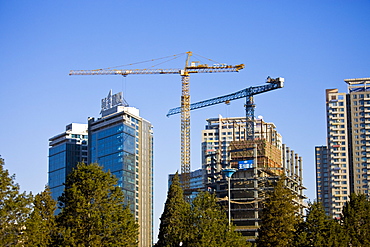 Modern glass skyscapers being built in Beijing, China