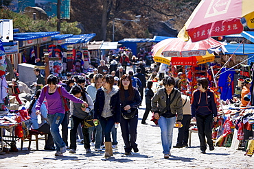 Tourists walk through souvenir stalls at The Great Wall of China, Mutianyu, north of Beijing