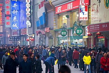 Crowded Wangfujing street and shops in Central Beijing, China