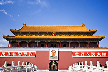 Soldier stands infront of Chairman Mao's portrait at Gate of Heavenly Peace, Entrance to the Forbidden City, China