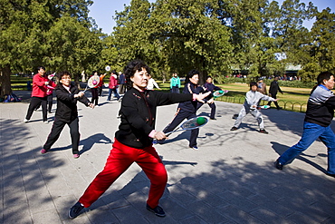 Tai chi with bat and ball in park of the Temple of Heaven, Beijing, China