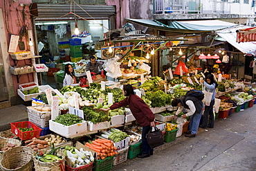 Fruit and vegetables on sale in old Chinese Soho food market in Graham Street, Central Hong Kong, China