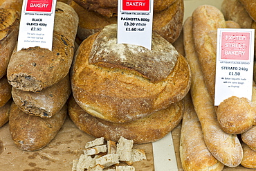 Artisan Italian bread Pagnotta, Black Olives and Stirato on sale at Exeter Street Bakery stall in Farmers' Market