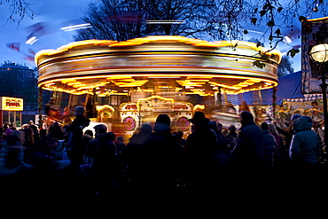 Merry-go-round carousel at Christmas fairground and market, Winter Wonderland, in Hyde Park, London