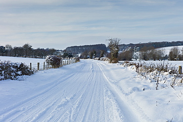 Snowy landscape in Swinbrook in The Cotswolds, UK