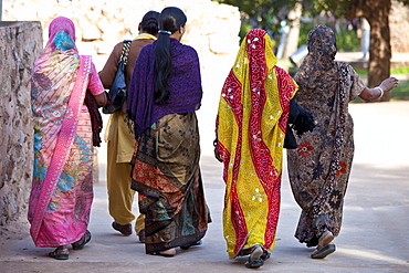 Indian Hindu women at Qutab Minar Complex, Unesco World Heritage Site in New Delhi, India