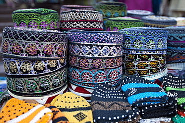 Traditional muslim prayer caps, takiyah, or kufi, on sale at Meena Bazar market in Muslim area of Old Delhi, India