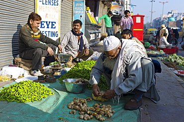 Old Delhi, Daryagang fruit and vegetable market with ginger and chillies on sale, India